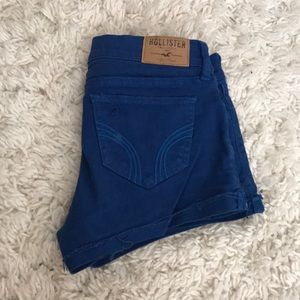 Ripped blue jean shorts